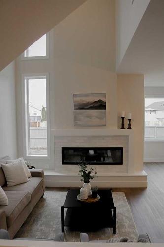 2714 43Rd Street South, Lethbridge, AB - Indoor Photo Showing Living Room With Fireplace