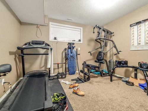 303 Twinriver Road West, Lethbridge, AB - Indoor Photo Showing Gym Room