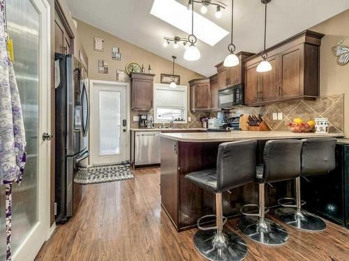 303 Twinriver Road West, Lethbridge, AB - Indoor Photo Showing Kitchen With Upgraded Kitchen