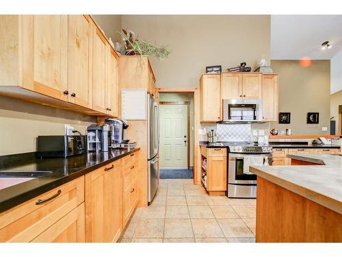 11 Ironstone Dr, Coleman, AB - Indoor Photo Showing Kitchen With Double Sink