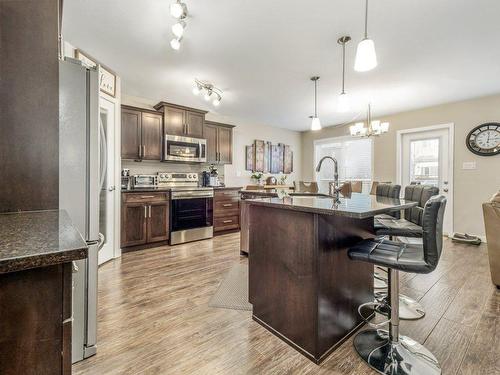 39 Moonlight Boulevard West, Lethbridge, AB - Indoor Photo Showing Kitchen With Upgraded Kitchen