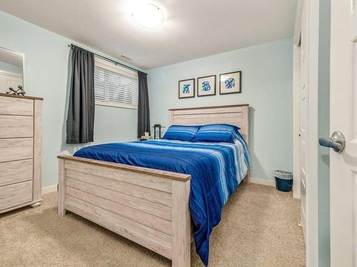 39 Moonlight Boulevard West, Lethbridge, AB - Indoor Photo Showing Bedroom