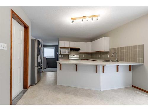 2114 16A Avenue, Coaldale, AB - Indoor Photo Showing Kitchen