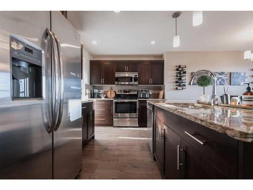 354 Mt Sundance Landing West, Lethbridge, AB - Indoor Photo Showing Kitchen With Upgraded Kitchen