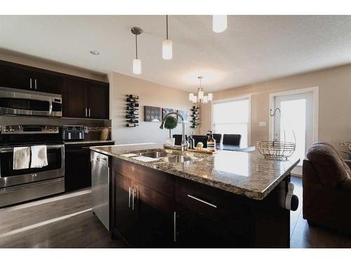 354 Mt Sundance Landing West, Lethbridge, AB - Indoor Photo Showing Kitchen With Double Sink