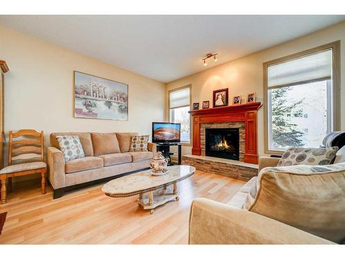 5-150 Fairmont Road South, Lethbridge, AB - Indoor Photo Showing Living Room With Fireplace