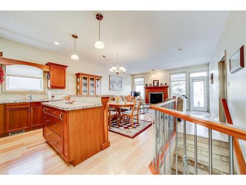 5-150 Fairmont Road South, Lethbridge, AB - Indoor Photo Showing Kitchen With Fireplace