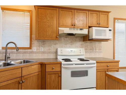 761 Red Crow Boulevard West, Lethbridge, AB - Indoor Photo Showing Kitchen With Double Sink