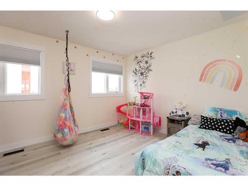 106 Bonavista Drive, Rural Lethbridge County, AB - Indoor Photo Showing Bedroom