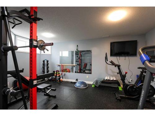 106 Bonavista Drive, Rural Lethbridge County, AB - Indoor Photo Showing Gym Room