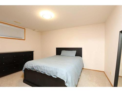 106 Bonavista Drive, Rural Lethbridge County, AB - Indoor Photo Showing Bedroom