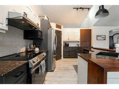 106 Bonavista Drive, Rural Lethbridge County, AB - Indoor Photo Showing Kitchen With Stainless Steel Kitchen