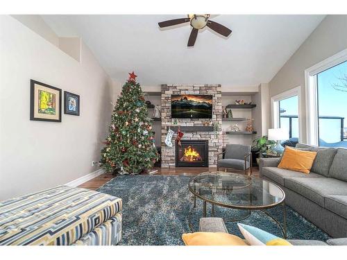 145 Sixmile Common South, Lethbridge, AB - Indoor Photo Showing Living Room With Fireplace