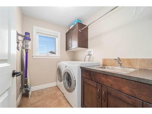 145 Sixmile Common South, Lethbridge, AB - Indoor Photo Showing Laundry Room