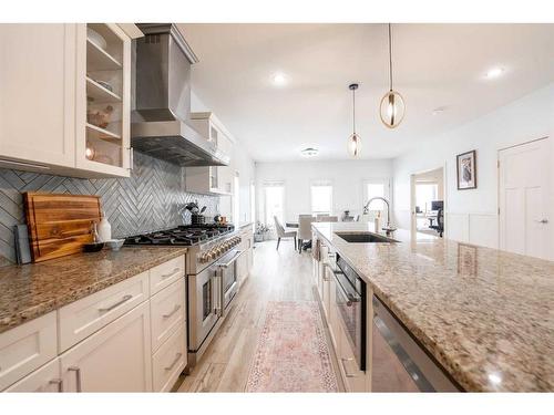 560 Aquitania Boulevard West, Lethbridge, AB - Indoor Photo Showing Kitchen With Upgraded Kitchen