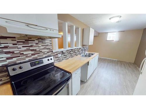 1304 18 Street South, Lethbridge, AB - Indoor Photo Showing Kitchen With Double Sink