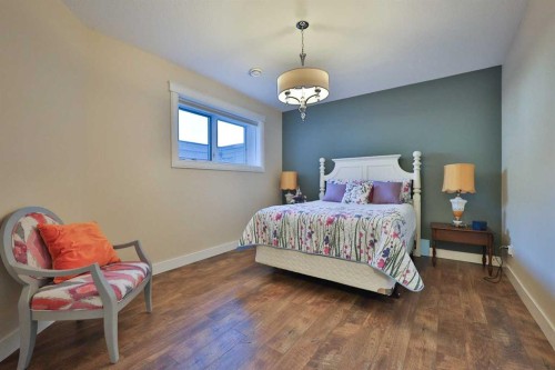 28 Cobblestone Lane, Raymond, AB - Indoor Photo Showing Bedroom