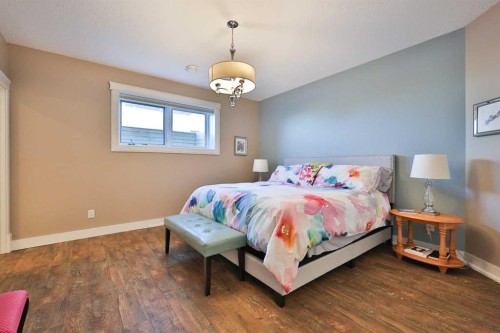 28 Cobblestone Lane, Raymond, AB - Indoor Photo Showing Bedroom