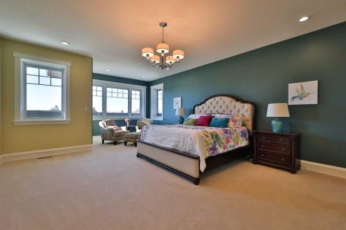 28 Cobblestone Lane, Raymond, AB - Indoor Photo Showing Bedroom