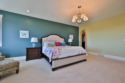 28 Cobblestone Lane, Raymond, AB - Indoor Photo Showing Bedroom