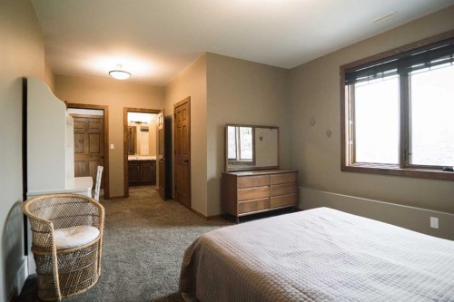 195041 Highway 512, Rural Lethbridge County, AB - Indoor Photo Showing Bedroom