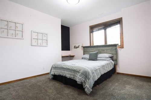 195041 Highway 512, Rural Lethbridge County, AB - Indoor Photo Showing Bedroom