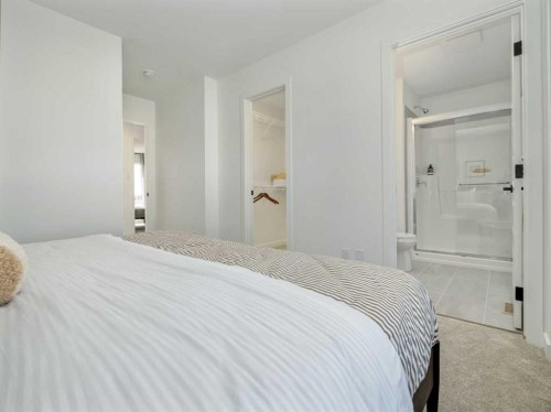 689 Blackwolf Boulevard North, Lethbridge, AB - Indoor Photo Showing Bedroom