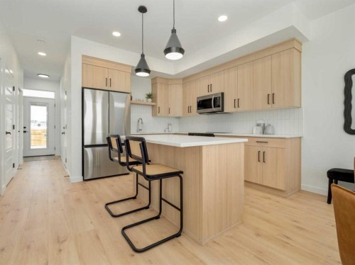 689 Blackwolf Boulevard North, Lethbridge, AB - Indoor Photo Showing Kitchen With Stainless Steel Kitchen