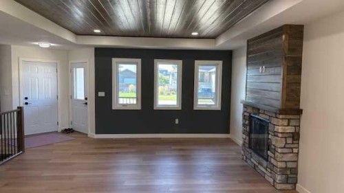 3 Greenview Crescent, Foremost, AB - Indoor Photo Showing Other Room With Fireplace