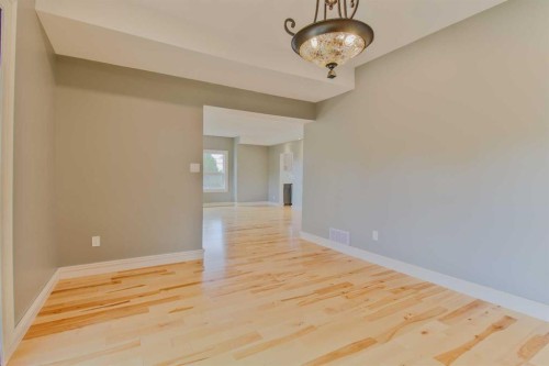 96S 100W, Raymond, AB - Indoor Photo Showing Other Room