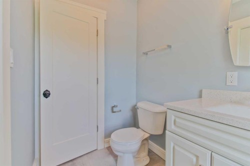 96S 100W, Raymond, AB - Indoor Photo Showing Bathroom