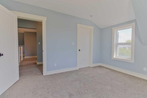 96S 100W, Raymond, AB - Indoor Photo Showing Other Room