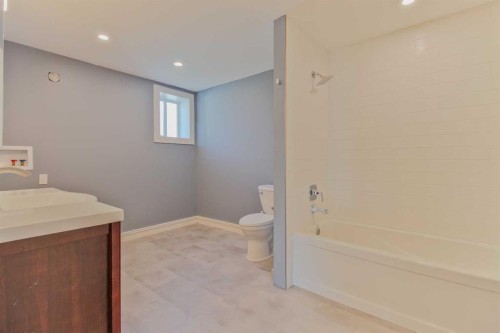 96S 100W, Raymond, AB - Indoor Photo Showing Bathroom