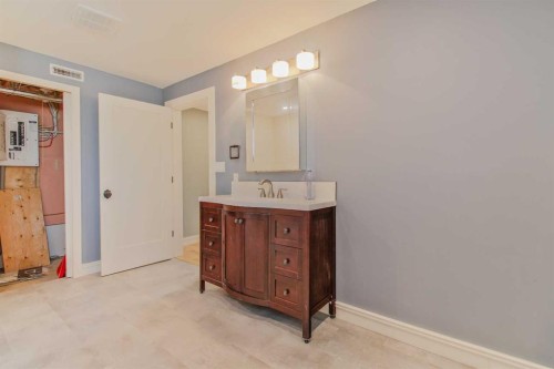 96S 100W, Raymond, AB - Indoor Photo Showing Bathroom