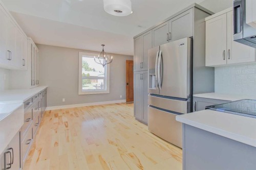 96S 100W, Raymond, AB - Indoor Photo Showing Kitchen