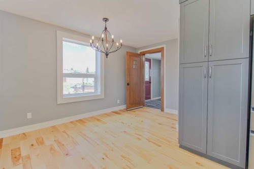 96S 100W, Raymond, AB - Indoor Photo Showing Other Room