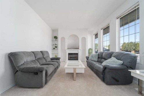 4612 50 Avenue, Taber, AB - Indoor Photo Showing Living Room With Fireplace
