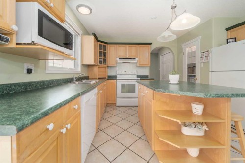 4612 50 Avenue, Taber, AB - Indoor Photo Showing Kitchen With Double Sink