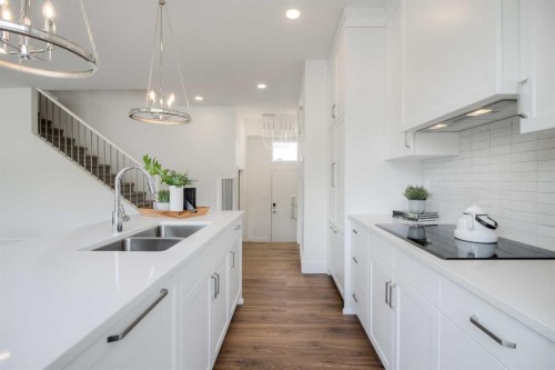 8615 25 Avenue, Coleman, AB - Indoor Photo Showing Kitchen With Double Sink With Upgraded Kitchen