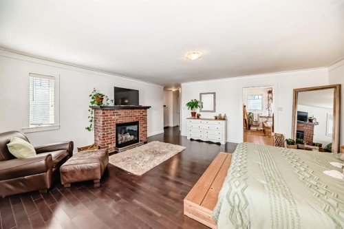 340 Tartan Circle West, Lethbridge, AB - Indoor Photo Showing Other Room With Fireplace