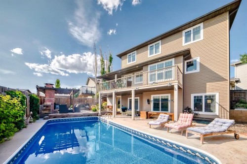 340 Tartan Circle West, Lethbridge, AB - Outdoor With In Ground Pool With Deck Patio Veranda