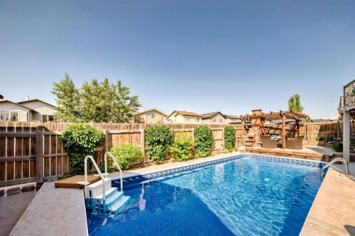340 Tartan Circle West, Lethbridge, AB - Outdoor With In Ground Pool With Backyard