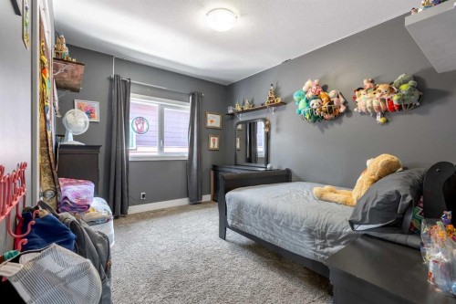 5401 43 Street, Taber, AB - Indoor Photo Showing Bedroom