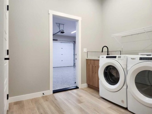 24 Tamarack Road East, Claresholm, AB - Indoor Photo Showing Laundry Room