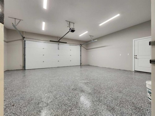 24 Tamarack Road East, Claresholm, AB - Indoor Photo Showing Garage