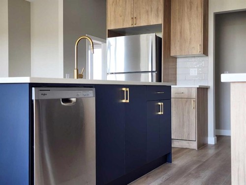 24 Tamarack Road East, Claresholm, AB - Indoor Photo Showing Kitchen