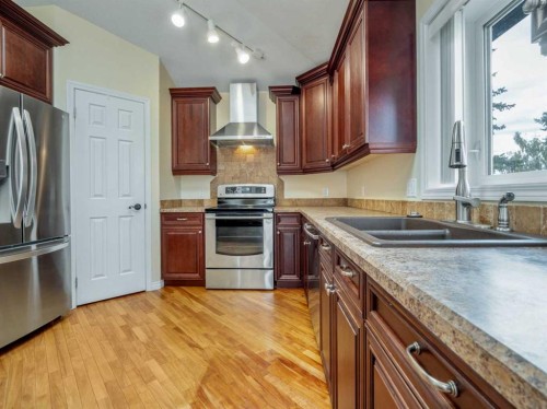 996 2 Avenue West, Cardston, AB - Indoor Photo Showing Kitchen With Stainless Steel Kitchen With Double Sink