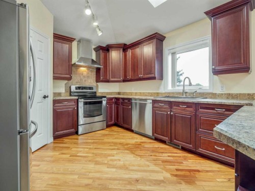 996 2 Avenue West, Cardston, AB - Indoor Photo Showing Kitchen With Stainless Steel Kitchen