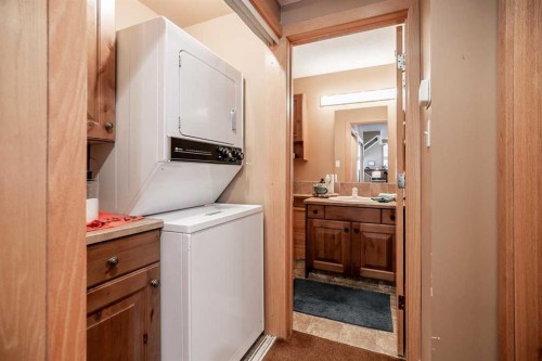 107 Mount View, Waterton Park, AB - Indoor Photo Showing Laundry Room