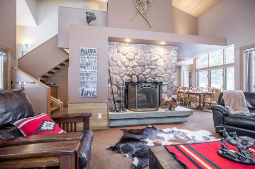 107 Mount View, Waterton Park, AB - Indoor Photo Showing Living Room With Fireplace